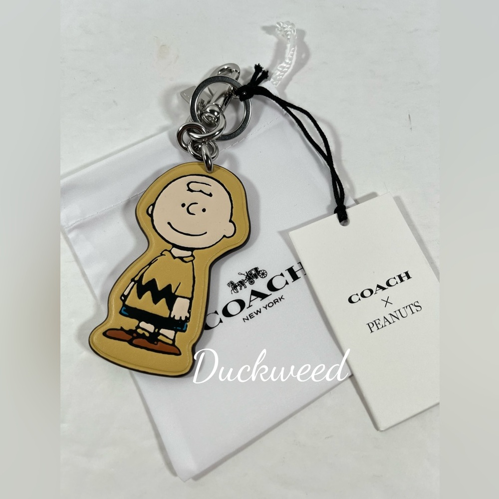 Sold ❌NWT Coach X Peanuts Charlie Brown Bag Charm CBG59 hay multi